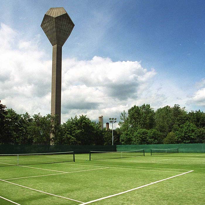 UCD water tower with tennis court in foreground